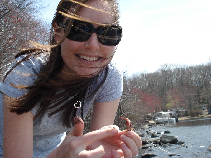 Kristen putting the worm on her hook